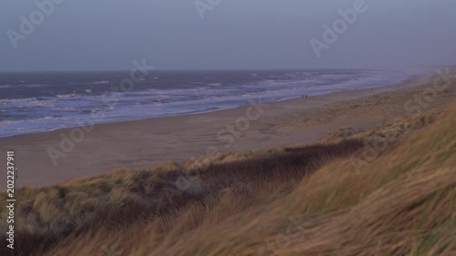 North Sea Waves Crashing on Sandy Beach at Dusk in The Hague