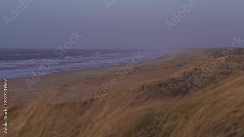 North Sea Waves Crashing on Sandy Beach at Dusk in The Hague