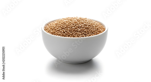 Bowl of granola or muesli cereal on a white surface