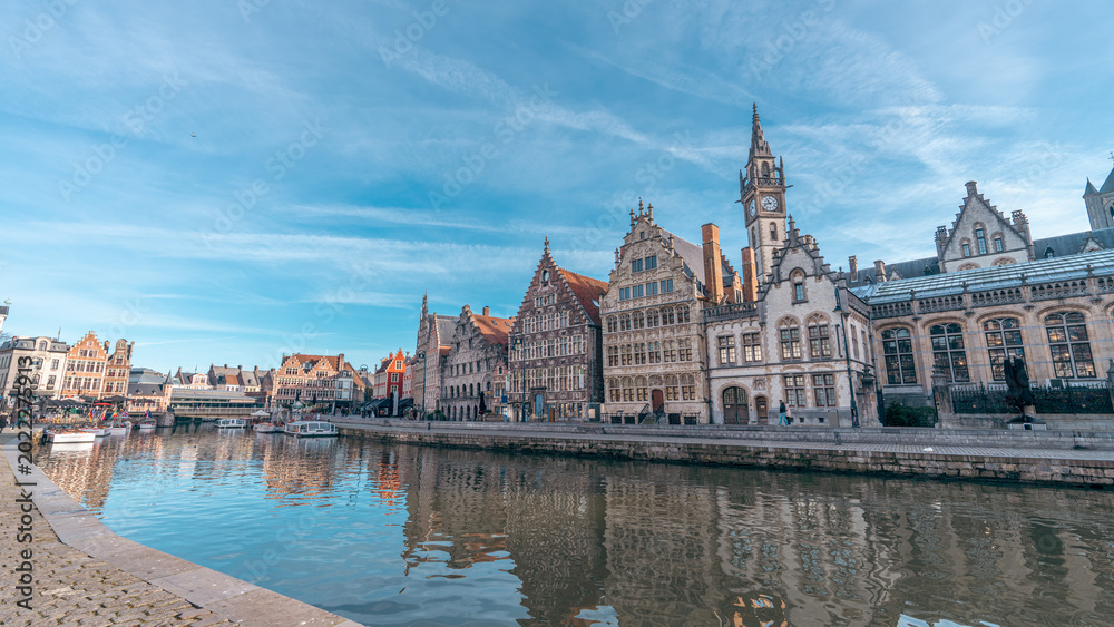 Fototapeta premium Historic canal cityscape in Ghent Belgium on a sunny day