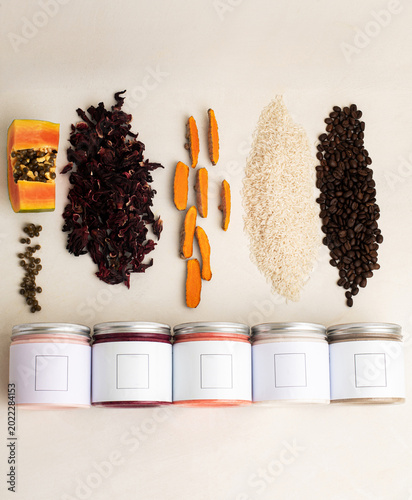 beauty products for skin care, bright bottles of cream, coffee, rice, turmeric, papaya  and red tea flavors
