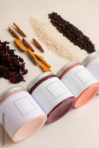 beauty products for skin care, bright bottles of cream, coffee, rice, turmeric and red tea flavors