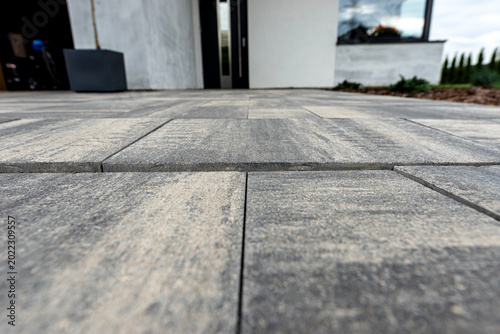 Quadro su tela Sunken paving slabs on residential driveway showing subsidence