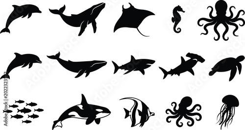 Foto Black silhouettes of various sea creatures, including dolphins, whales, fish, an