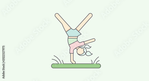 Fotografía Woman doing handstand on green grass.