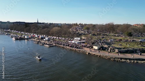 Large Crowd Gathering at Kaivopuisto During Vappu Festival