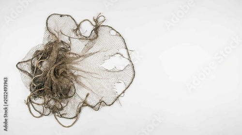 Fishing Net Tangled With Debris On White Background