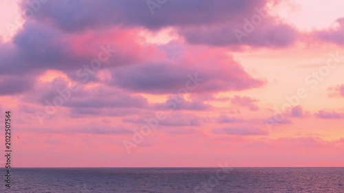 Amazing relaxing sea view multi colored sky puffy clouds sun time lapse, evening bay beach sky clouds, summer colorful sunset ocean in sun light, motion, travel, vacation.