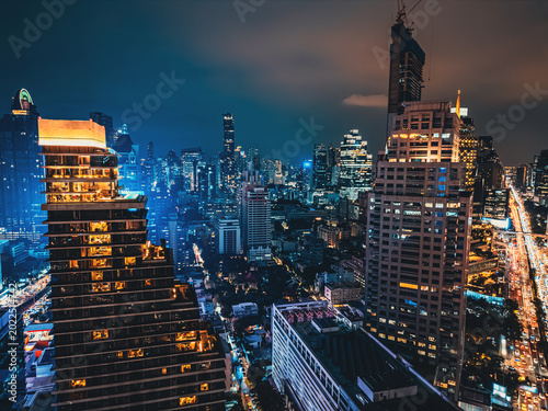 Fotografía Bangkok city skyline and illuminated high-rise skyscraper buildings, Night citys