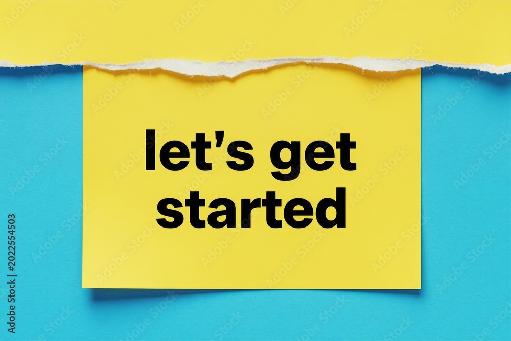Fototapeta premium Yellow paper with text lets get started overlays blue surface torn paper. Bright graphic design conveys start, progress, motivation for new projects. Simple modern message.