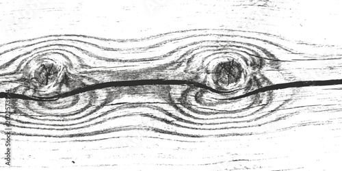 Foto Natural wood grain texture with two dark round knots in a horizontal pine board