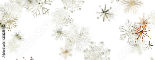 Canvas Print Beautiful white and gold snowflakes scattered across a clean background