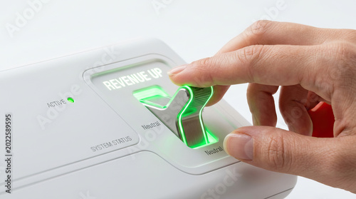Revenue increase financial growth business success hand pressing button green light system status active indicator technology control modern device income boost profit rise economic improvement