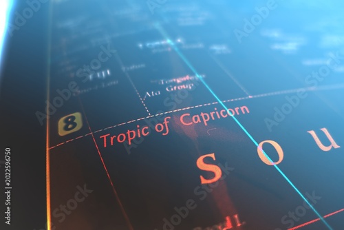 Map of Tropic of Capricorn styled in cyber blue colors. Selective focus on label, close-up view