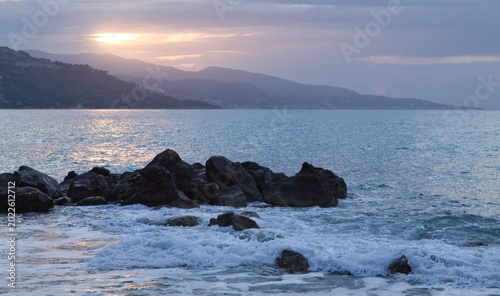 dramatic sky over sea ,Mediterranean Sea view from Cap Martin with distant mountains and calm water