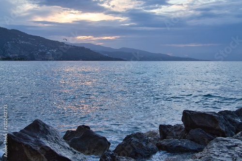 dramatic sky over sea ,Mediterranean Sea view from Cap Martin with distant mountains and calm water