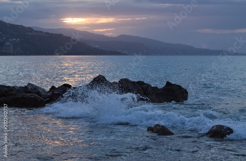 dramatic sky over sea ,Mediterranean Sea view from Cap Martin with distant mountains and calm water