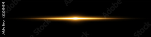 Cuadro en lienzo Bright horizontal beam of light on black background