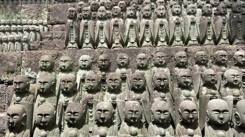 Stone Buddha statues in the Hase Temple, Kamakura, Japan. Hasedera religious temple