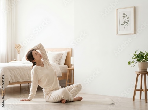 Woman Practicing Yoga Side Stretch on Mat in Peaceful Bedroom