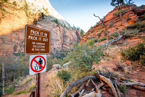 Obraz na plátne A no littering sign along the West Rim trail in Zion National Park, Utah