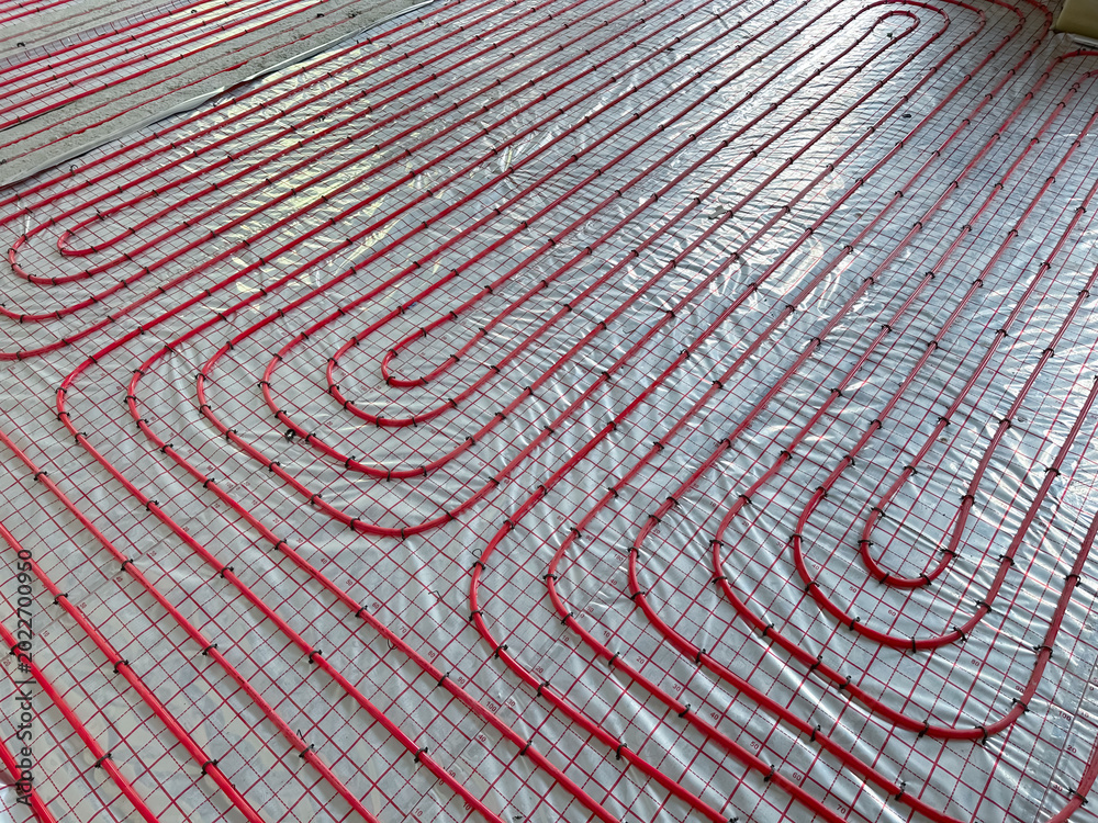 Fototapeta premium Installation of underfloor heating system in building, above view