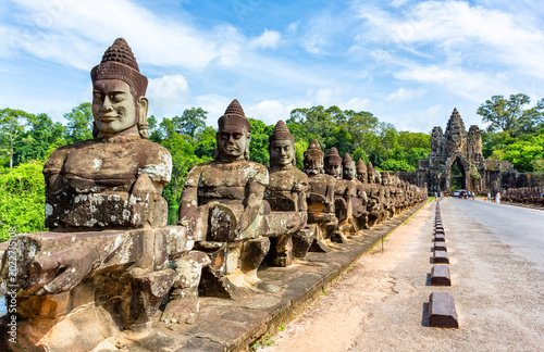 Stone statues leading to Angkor Thom gate