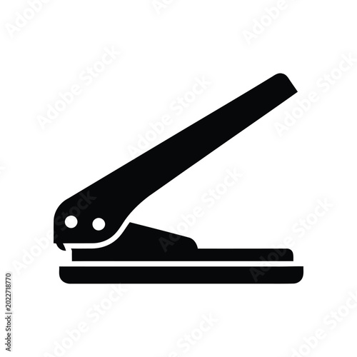 Schilderij op canvas Black single hole puncher on a white background for office use