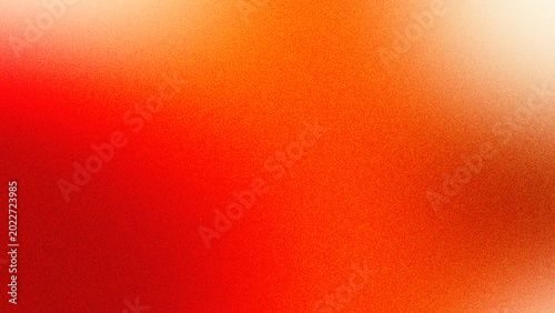 Abstract grainy gradient background with light spots on red for web banner.
