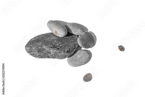 Top view of scattered grey river pebbles with sharp shadows isolated on white or transparent background. Authentic rock textures and diverse shapes perfect for realistic architectural collages