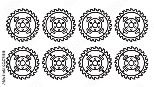 Set of eight circular saw blades with sharp teeth in a grid pattern against a white background
