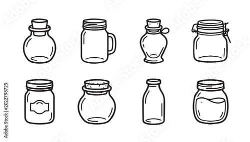 Various empty glass jars with different lids arranged in two rows on a white background