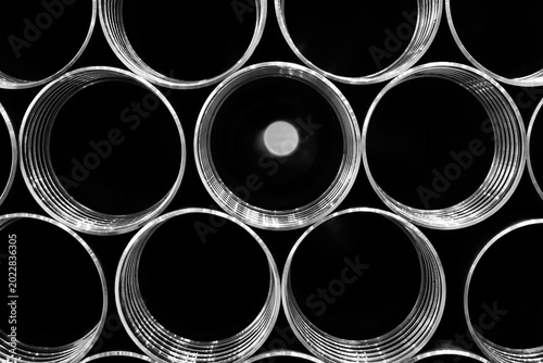 Photography Stacked metal pipes create a tight arrangement
