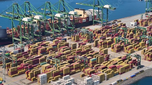 Global supply chain issues impact container logistics and cargo delivery at port facilities amid shipping congestion