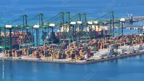 Global supply chain disruptions and shipping congestion in major ports observed from aerial view