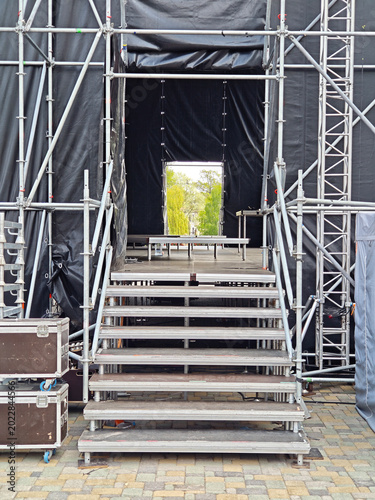 Rear view of a stage construction with metal stairs