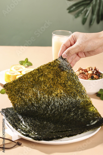 Konstfotografi Fresh nori seaweed sheets ready for sushi preparation, healthy Japanese cooking