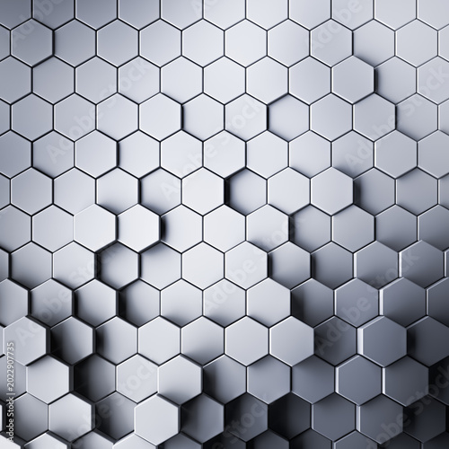 Smooth gray honeycomb background of patterned hexagons. Array of 3d rendered hex shapes creating a visual of a sleek, silver, metallic, pattern for futuristic, scientific, or technical backgrounds.