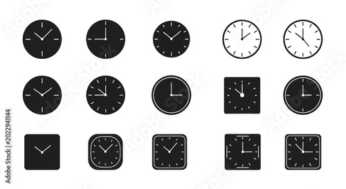 Фотография A collection of various clocks and watches displayed on a plain background