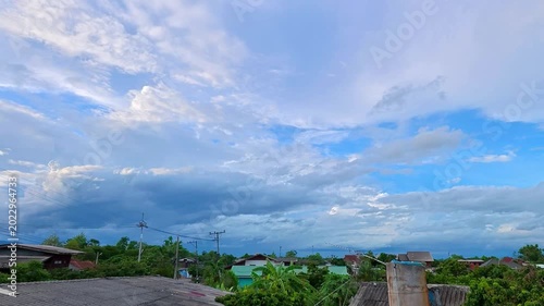 Timelapse of clouds moving in the evening, Countryside village Ciangmai Thailand.