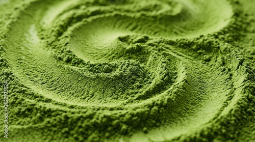 Closeup of vibrant green matcha tea powder with a swirling texture