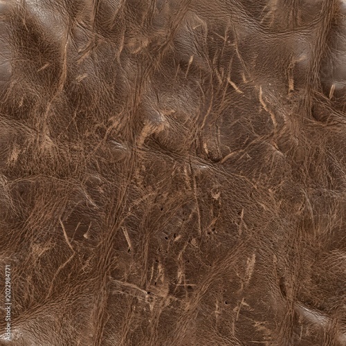 Detailed close-up of brown textured surface with intricate patterns and designs.
