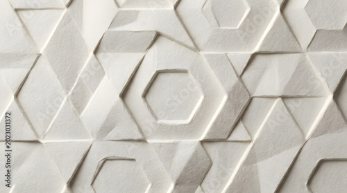 Abstract geometric pattern with embossed hexagonal and triangular shapes creating a modern, clean, and minimalist textured background, ideal for contemporary design elements