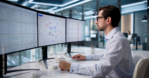 Fotografie Experienced Forensic Accountant Analyzing Suspicious Financial Data