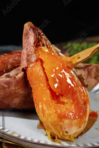 Bild auf Leinwand Roasted Sweet Potato with Caramelized Flesh Still Life Studio Food Photography