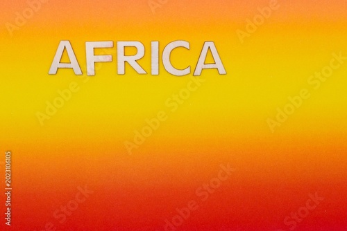 africa write on orange and yellow background 