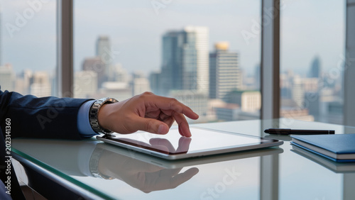 фотографія Businessman interacting with digital tablet