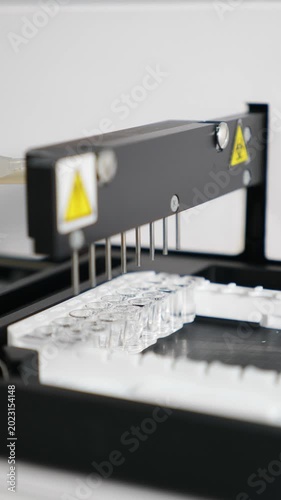 Medical hospital laboratory equipment for identifying hantavirus and disease. Vertical. Healthcare . Clinical blood analyzer of human bio sample. Automated process in biochemistry analyzer. 4 k video