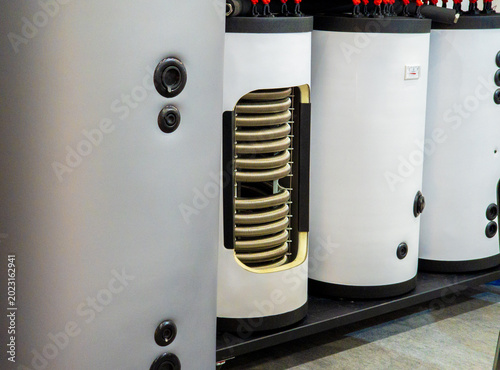 Cutaway View of Modern Water Heater Boiler with Internal Heat Exchanger Coil for Residential or Industrial Use