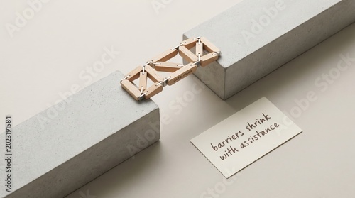 Wooden bridge connects concrete blocks with assistance note